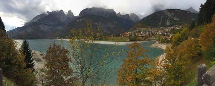 Scenic view of mountains and lake against sky