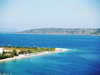 Scenic view of sea against blue sky