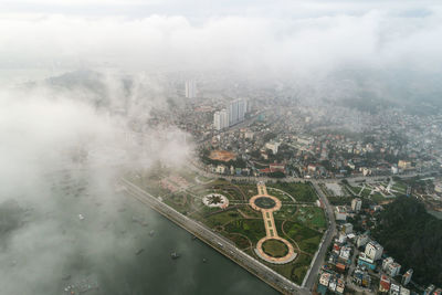 High angle view of buildings against sky in city