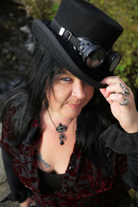 Close-up of senior woman wearing hat