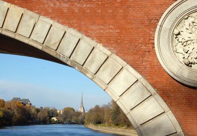 Arch bridge over river