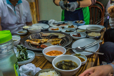 High angle view of people having food at restaurant