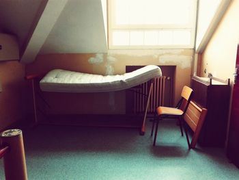 Chairs on window at home