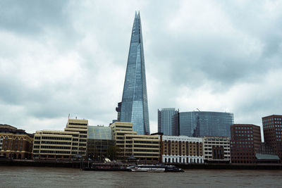 Low angle view of skyscrapers against sky