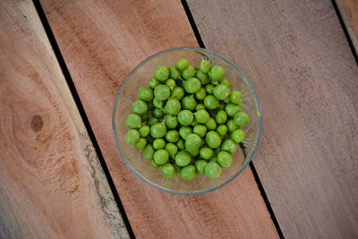 High angle view of fruits in bowl on table