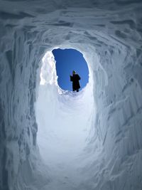 High angle view of people skiing in sea