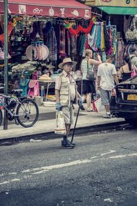 People at market stall