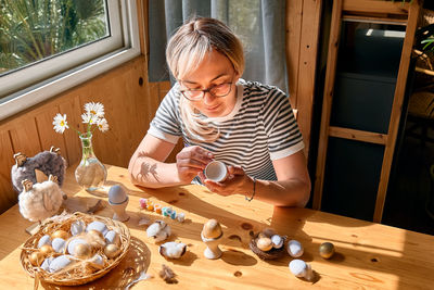 Boy playing with toys on table