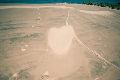 High angle view of sand at beach