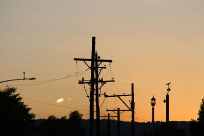 Low angle view of silhouette birds against sky during sunset