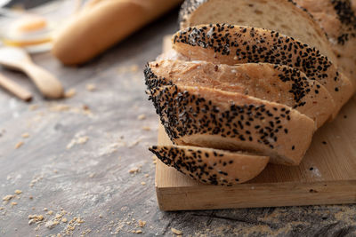 High angle view of bread on cutting board