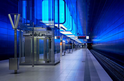 Blurred motion of illuminated subway station at night