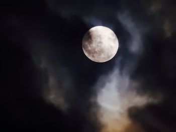 Low angle view of moon against sky at night