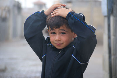 Portrait of cute boy in winter