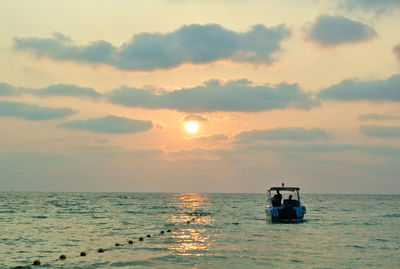 Sunset with speedboat in the sea at samed island in thailand.