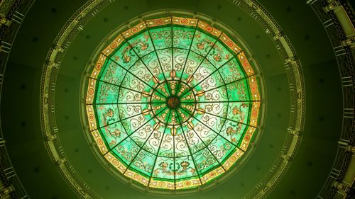 Low angle view of glass ceiling