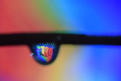 Close-up of illuminated lighting equipment on wall