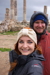 Portrait of a smiling young woman in winter