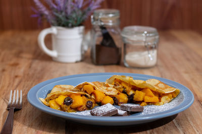 Close-up of breakfast served on table