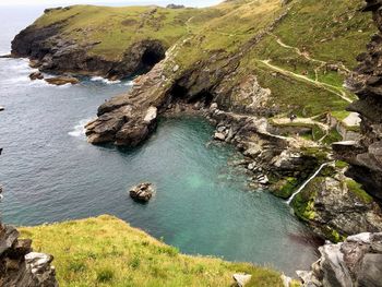 High angle view of mountain at sea shore