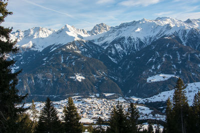 Scenic view of snowcapped mountains against sky