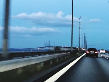 Bridge against sky in city