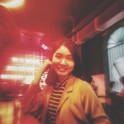 Portrait of smiling young woman