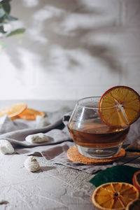 Fruits in glass on table