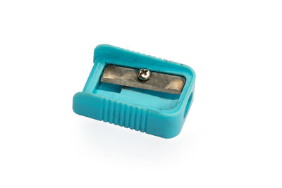 Close-up of coin-operated binoculars against white background