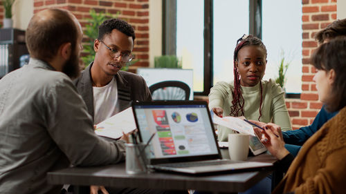 Business colleagues working at office