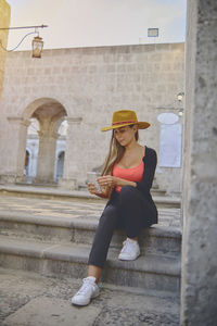 Tourist woman walking on vacation in street, arequipa, peru. selective focus