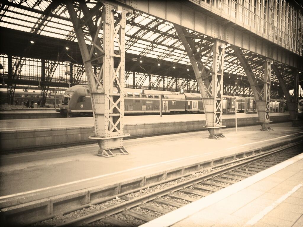 railroad track, rail transportation, railroad station platform, railroad station, public transportation, transportation, train - vehicle, passenger train, train, built structure, indoors, travel, mode of transport, architecture, public transport, railway track, railway station, station, transportation building - type of building, subway station