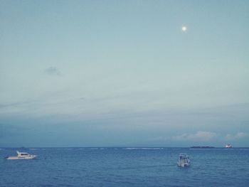 Boat sailing in sea