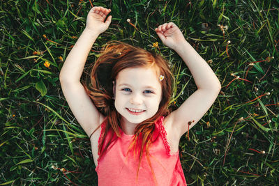 Portrait of a smiling girl on field