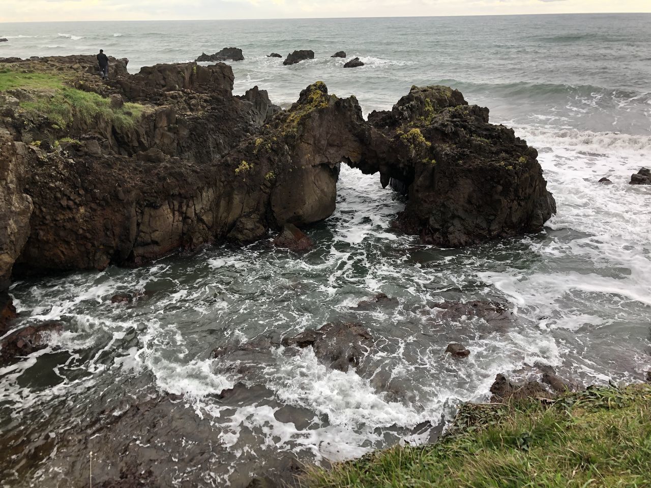 SCENIC VIEW OF ROCKS ON SEA