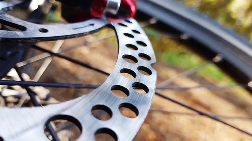 Close-up of bicycle tire on field