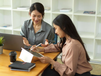 Young businesswomen working in office