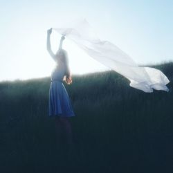 Woman standing on field