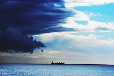 Distant ship on sea