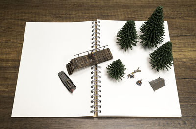 High angle view of paper board on table