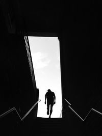 Full length of woman standing against sky