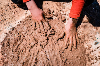 High angle view of hands