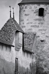 Low angle view of old building against sky