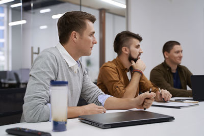 Business colleagues working at office