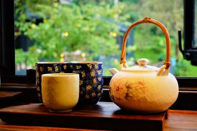 Close-up of crockery on table