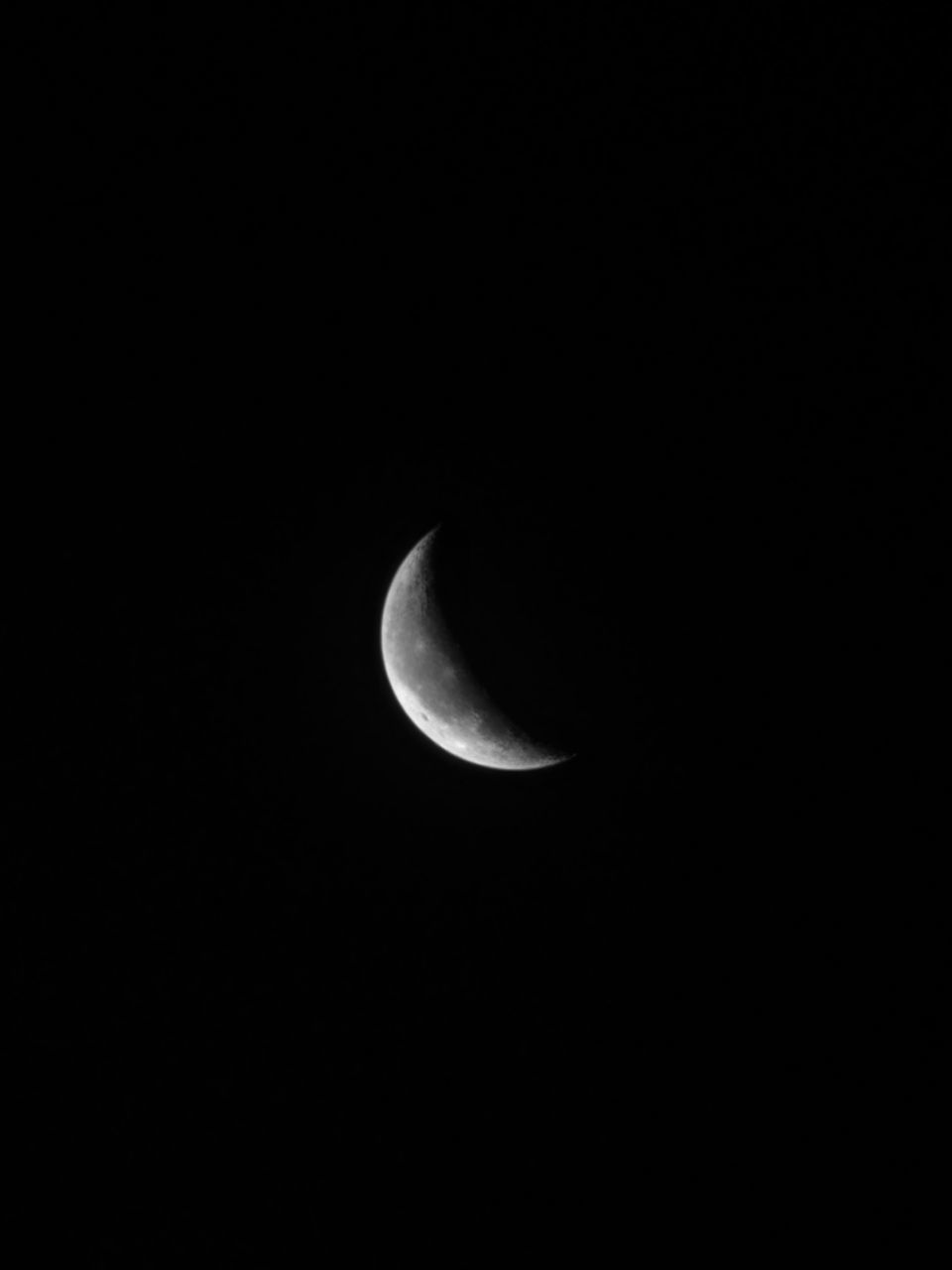 crescent, space, moon, astronomy, night, sky, copy space, beauty in nature, black and white, half moon, no people, tranquility, scenics - nature, low angle view, tranquil scene, darkness, planetary moon, nature, dark, circle, idyllic, astrology, moon surface, eclipse, natural phenomenon, celestial event, space and astronomy, clear sky, outdoors