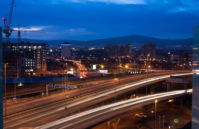 High angle view of illuminated city at night