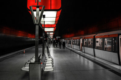 Train at railroad station at night