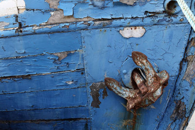 Close-up of old rusty metal door