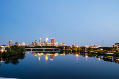 Reflection of buildings in calm water